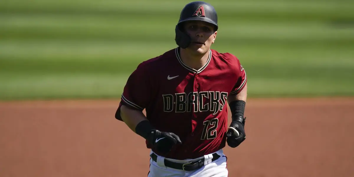 Blue Jays Outfielder Daulton Varsho Jogging the Bases After Home-Run