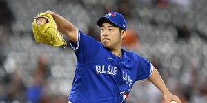 Blue Jays Left-Handed Pitcher Yusei Kikuchi Mid-Wind Up Set to Deliver Next Pitch