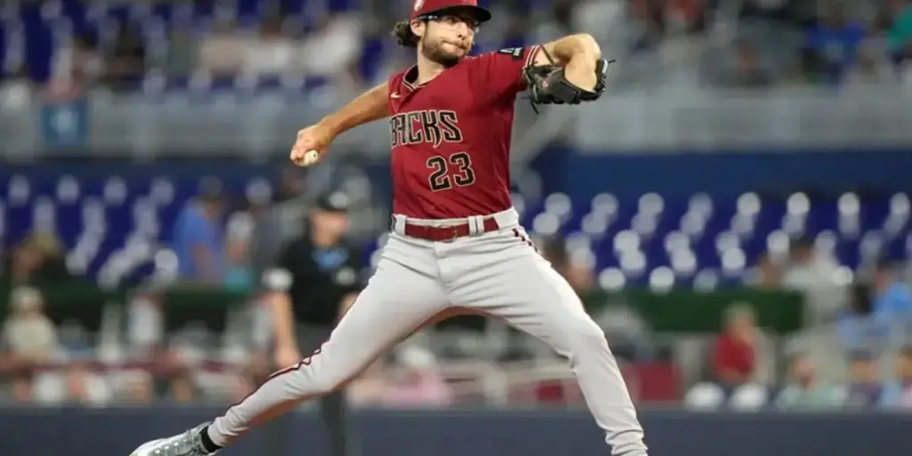 Arizona Diamondbacks starting pitcher Zac Gallen throws during the first inning of a baseball game against the Miami Marlins, Sunday, April 16, 2023, in Miami. (AP Photo/Lynne Sladky)